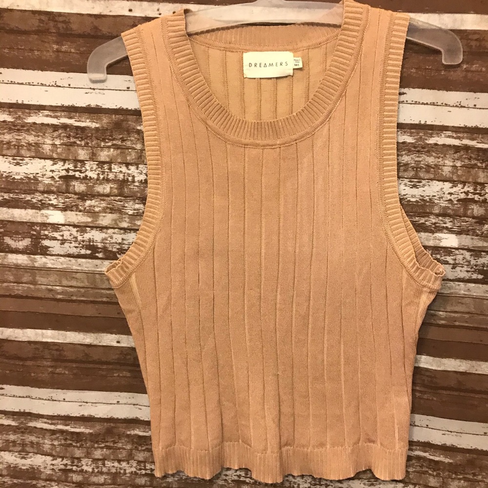 Sleeveless cream color crop top